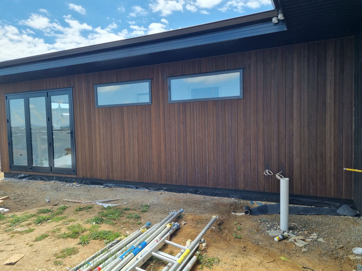 Brywood Rise, dark-clad modern home exterior