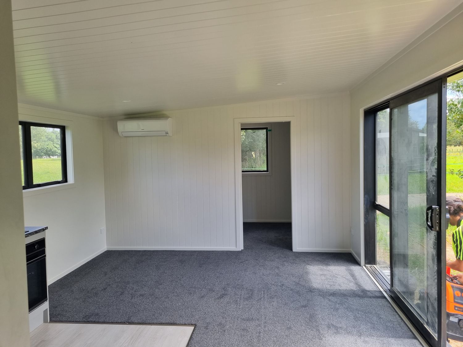 Transportable home, living area with indoor-outdoor flow